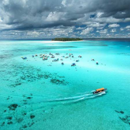aerial-view-of-boats-in-clear-azure-sea-in-summer-2024-12-04-22-38-13-utc